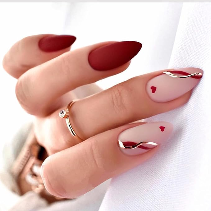 Matte red and natural nails with heart design