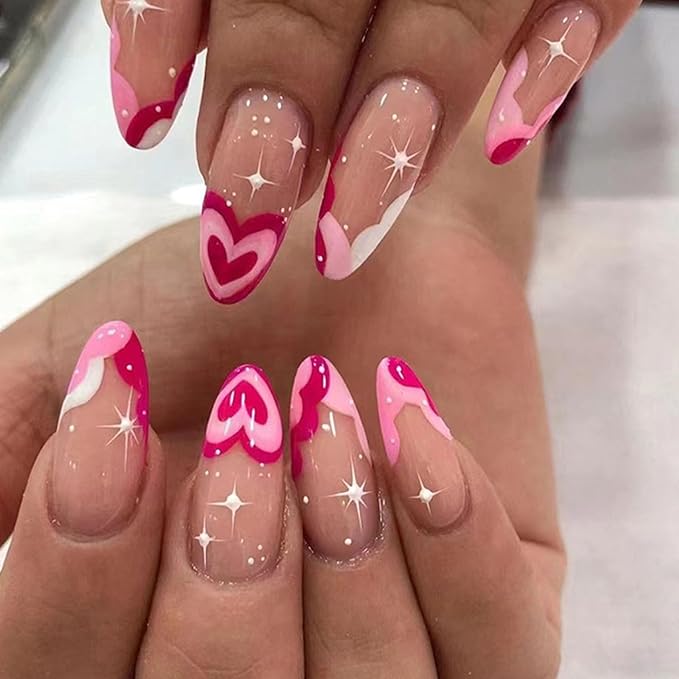 Retro pink heart nails with starbursts